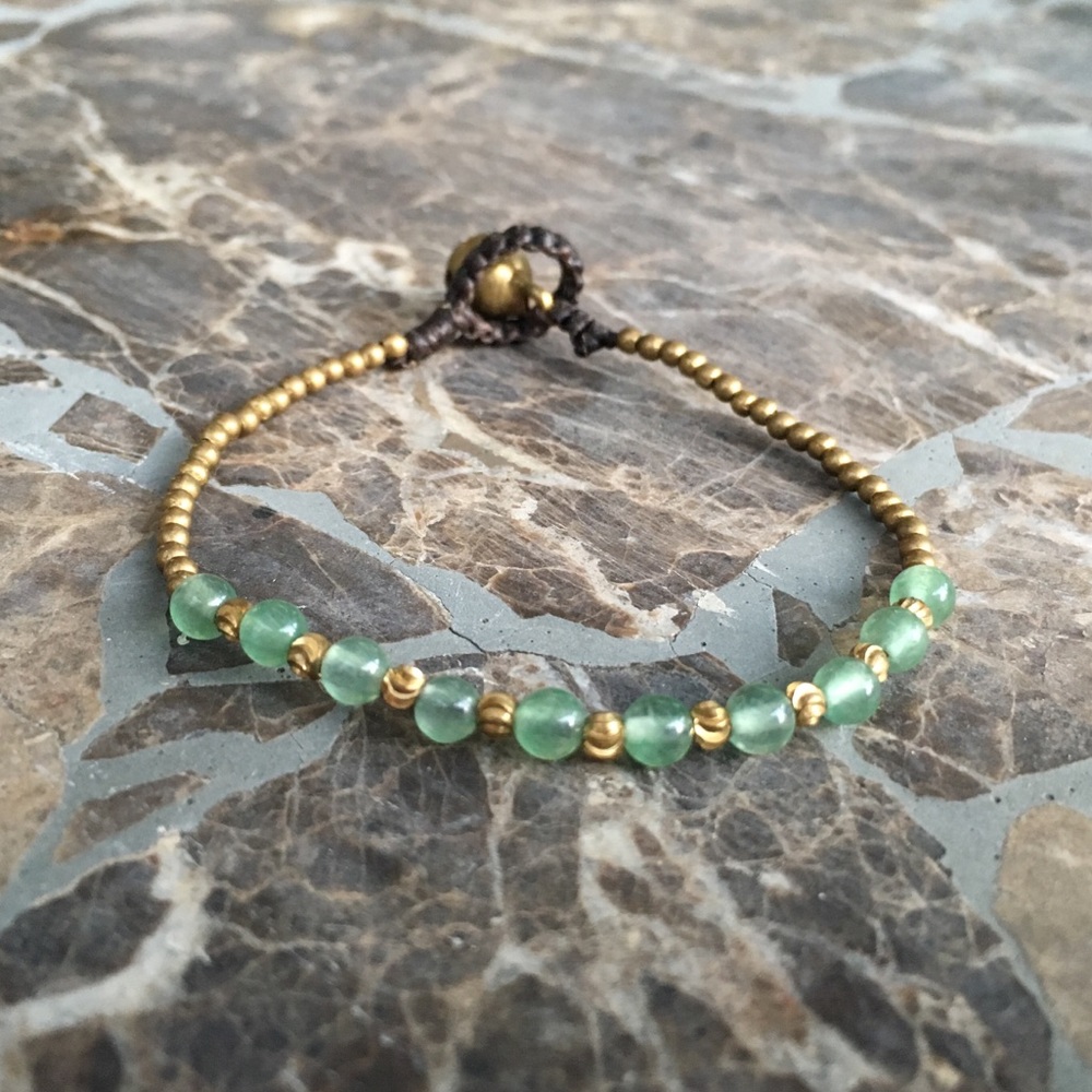 Hand woven bohemian beaded bracelet with bell